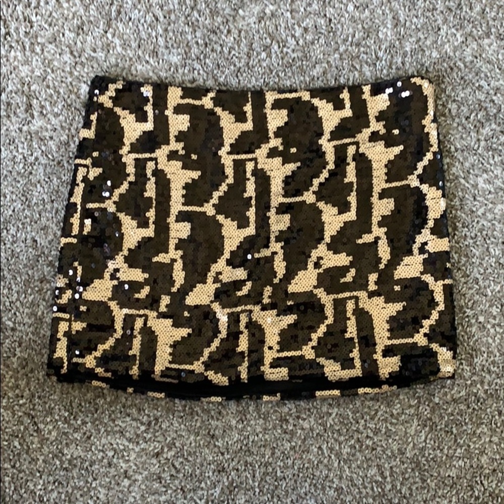 Sequence black and gold mini skirt